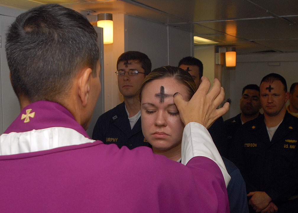 1008px US Navy 080206 N 7869M 057 Electronics Technician 3rd Class Leila Tardieu receives the sacramental ashes during an Ash Wednesday celebration
